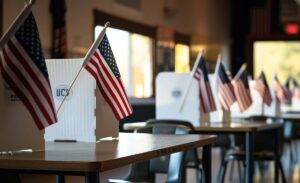 Interior of an empty polling place in the USA. . Elections in the USA and democracy concept, ai; generative; usa; america; election; day; president; flag; polling; place; empty; table; chair; interior; office; room; desk; chairs; conference; meeting; house;