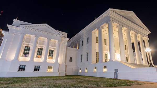 The Virginia State Capitol at night. Designed by Thomas Jefferson who was inspired by Greek and Roman Architecture in Richmond, Virginia.